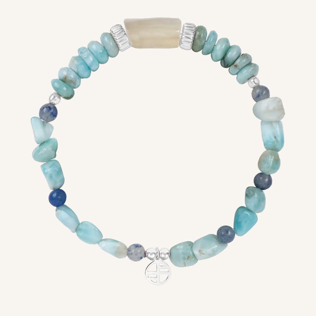Beaded bracelet with blue and green stones on a white background