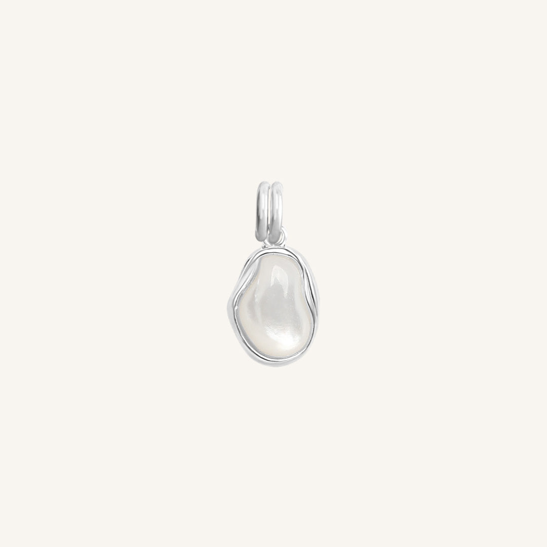 Silver pendant with a teardrop-shaped white stone on a light gray background