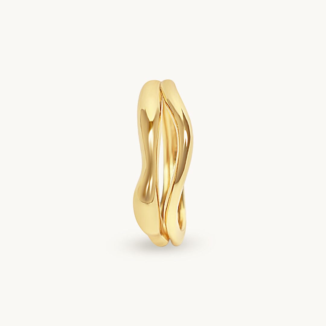 Gold ring on a white background