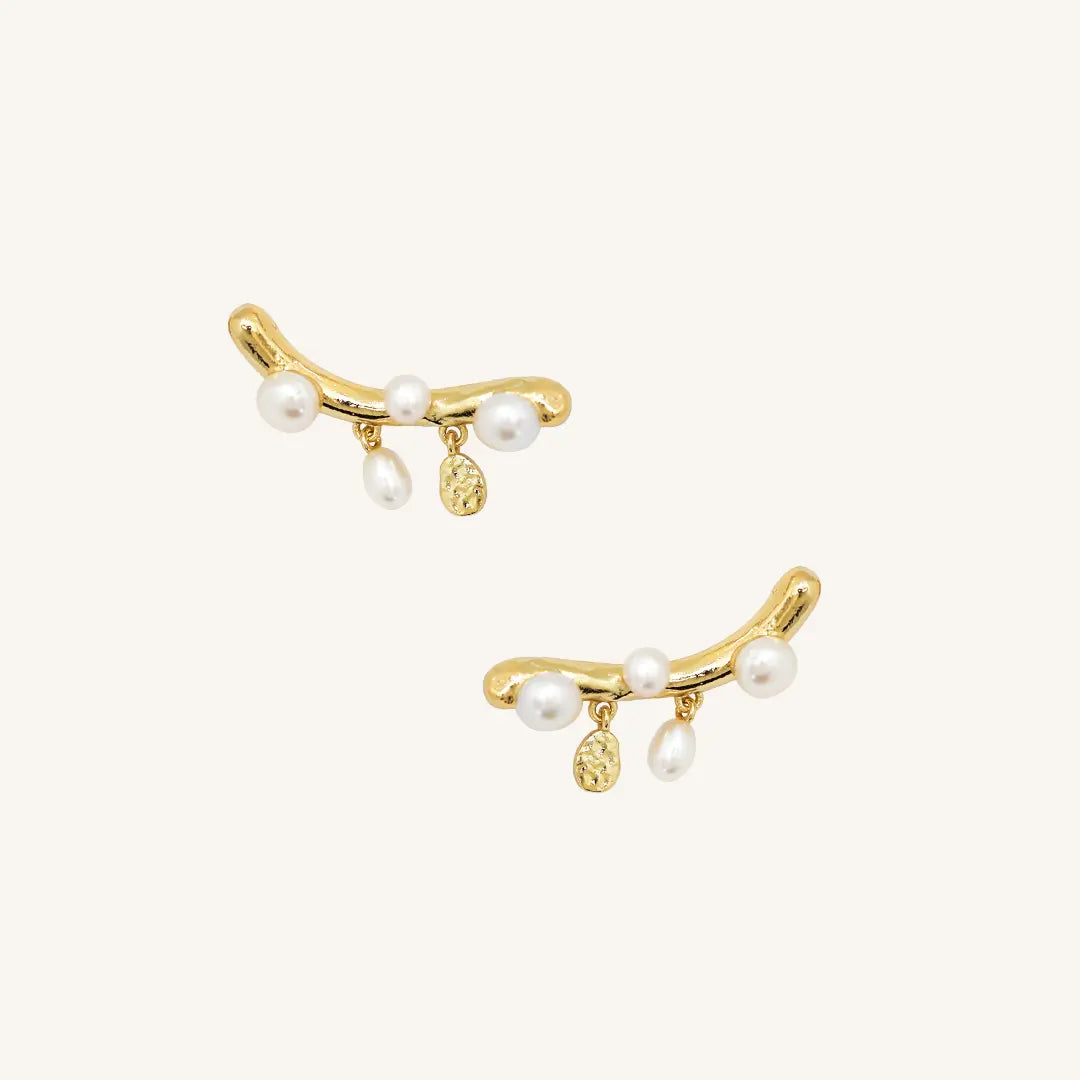 The GOLD Pearl Crawlers by Francesca Jewellery from the Earrings Collection.