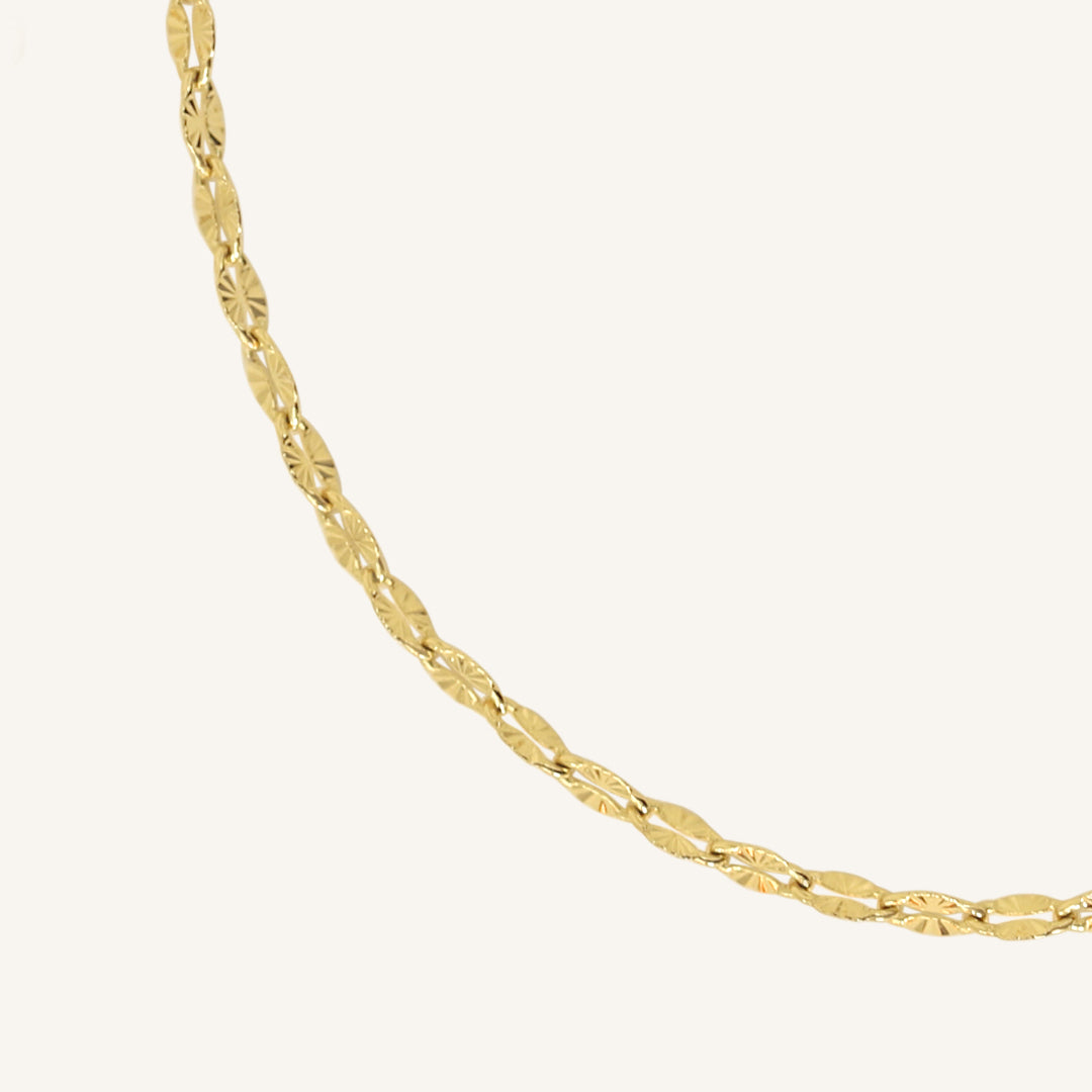 Gold chain on a white background