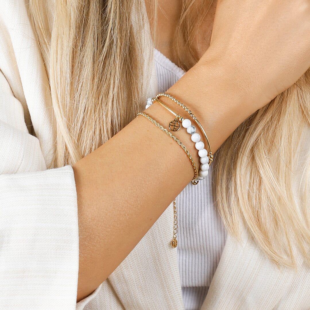 Bracelets stacked on wrist