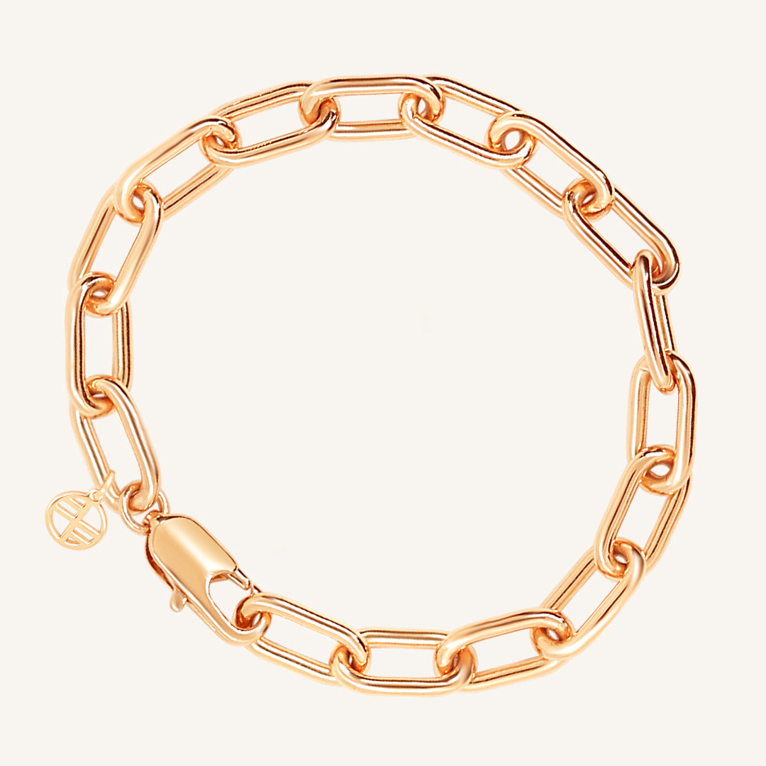 A chunky link style bracelet in rose tone, featuring a clasp closure.