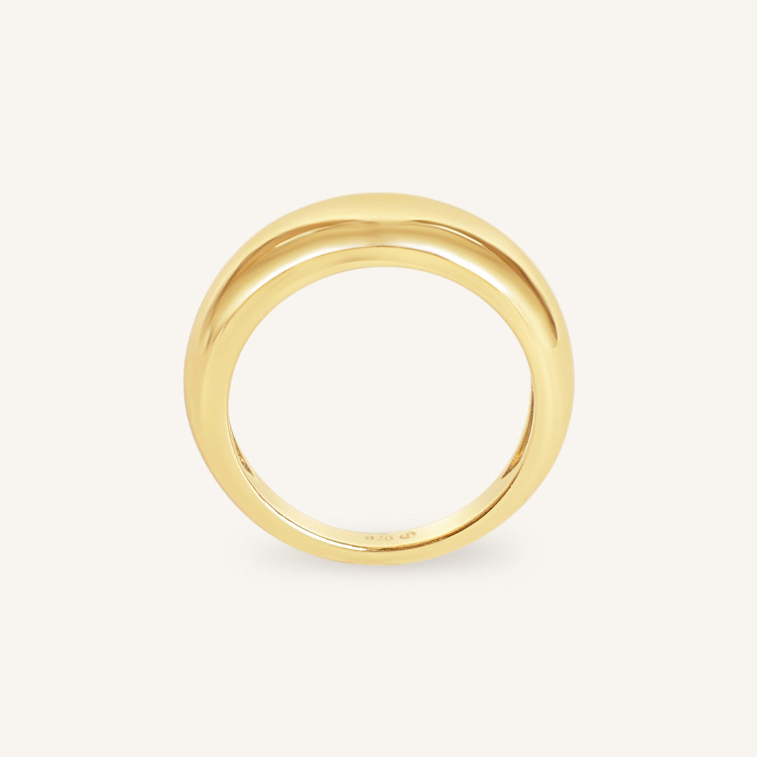 Gold ring on a white background
