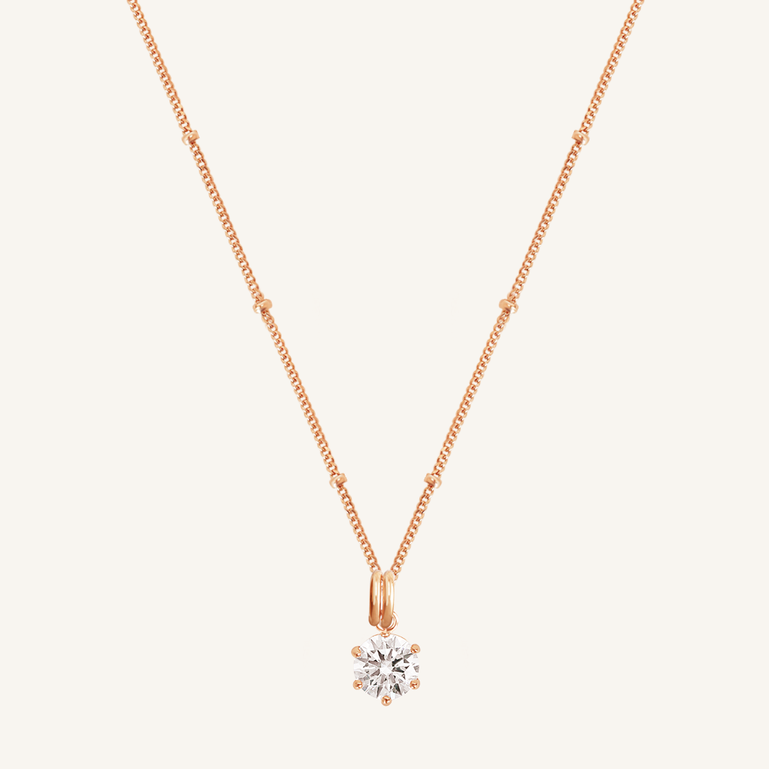 Round, rose, cubic zirconia charm on gold chain