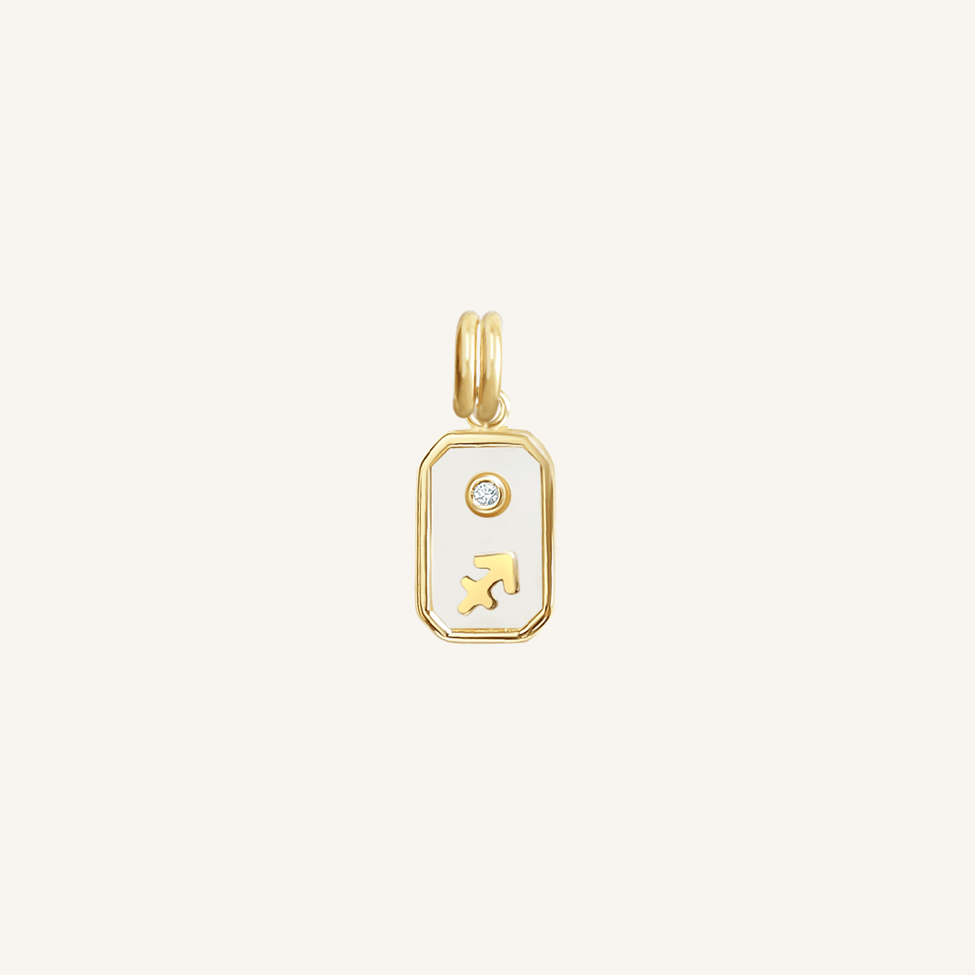 A gold iridescent zodiac charm representing the Sagittarius sign, with a loop for attachment on a chain
