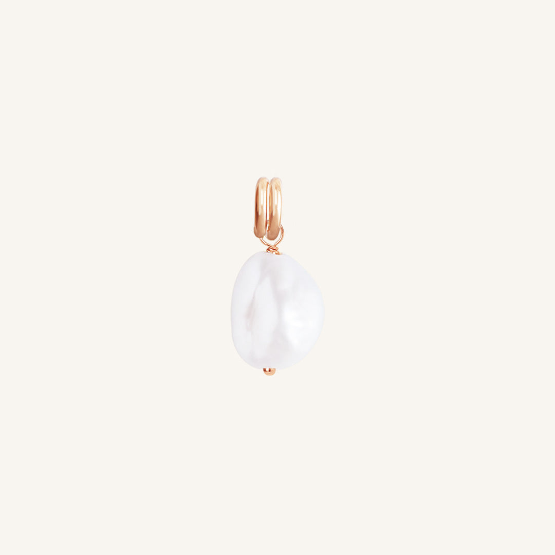 A single Keshi pearl charm with rose findings, displayed against a white background.