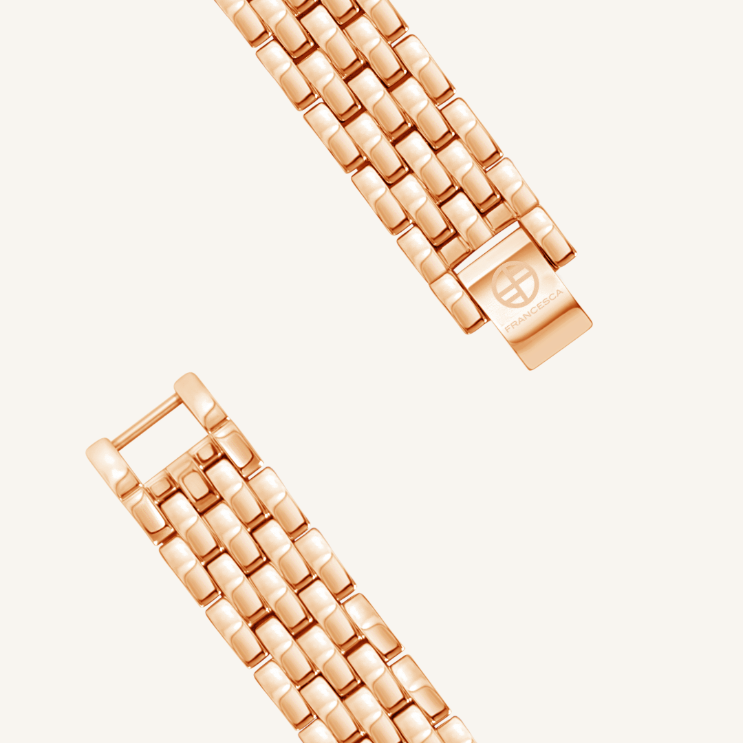 A luxurious rose gold-coloured metal watch band