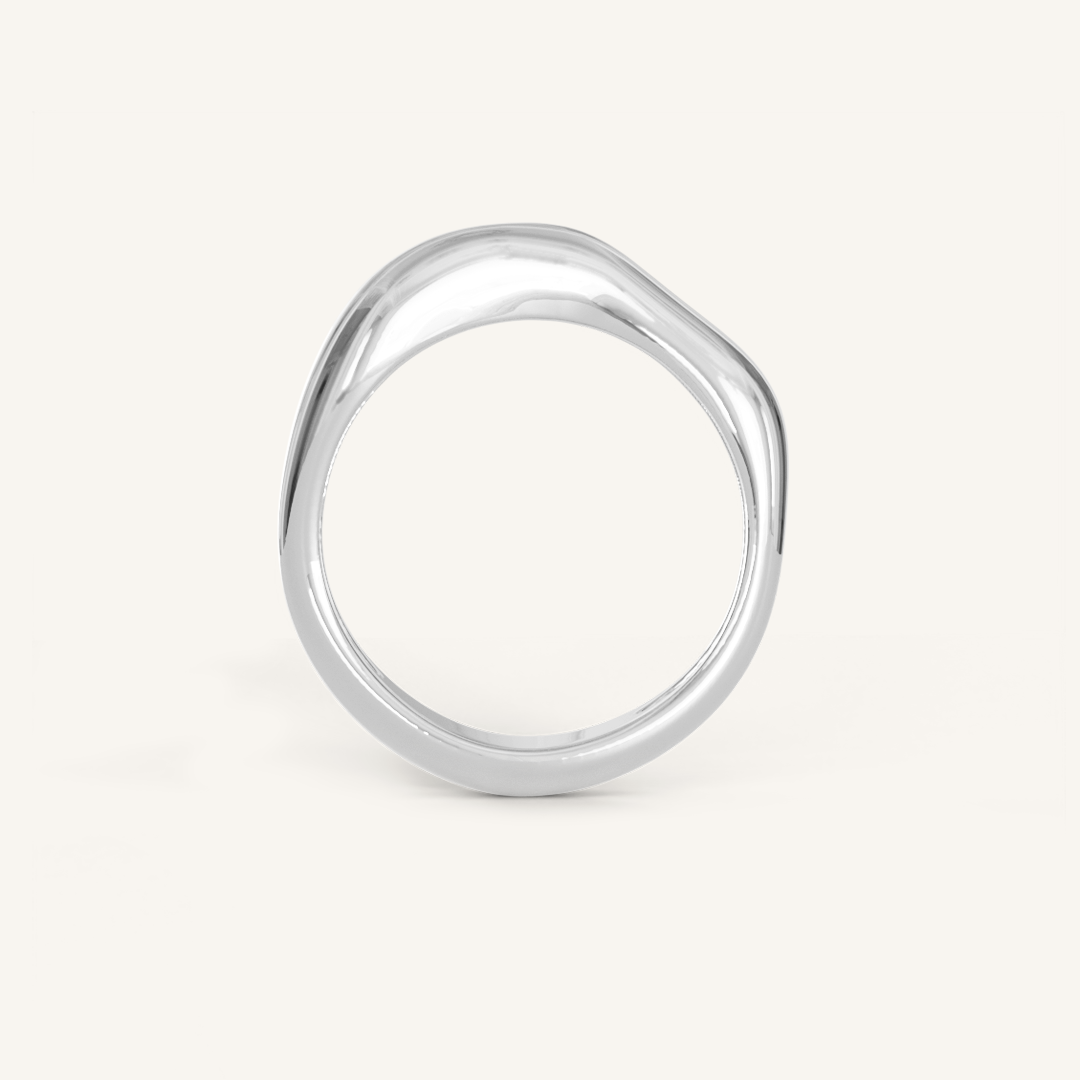 A silver-coloured ring with an irregular, smooth shape on a white background
