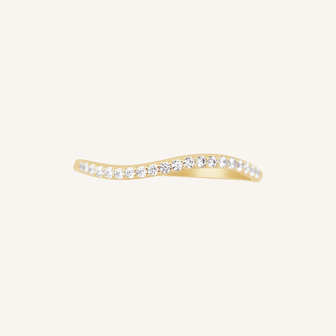 A slim, elegant ring with multiple small cubic zirconias set in a coloured band.
