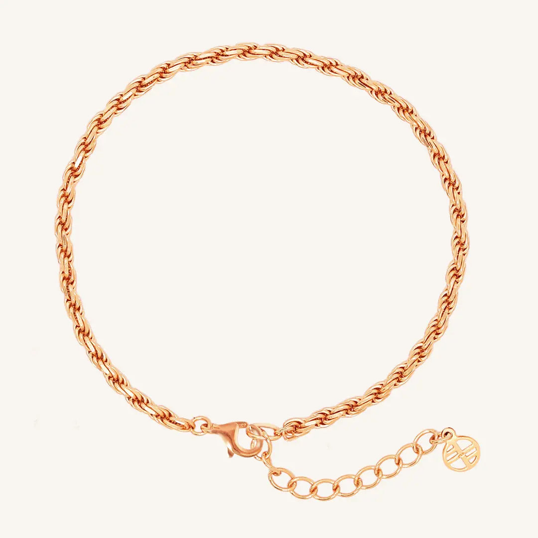 A rose-tone rope bracelet with a extender chain.
