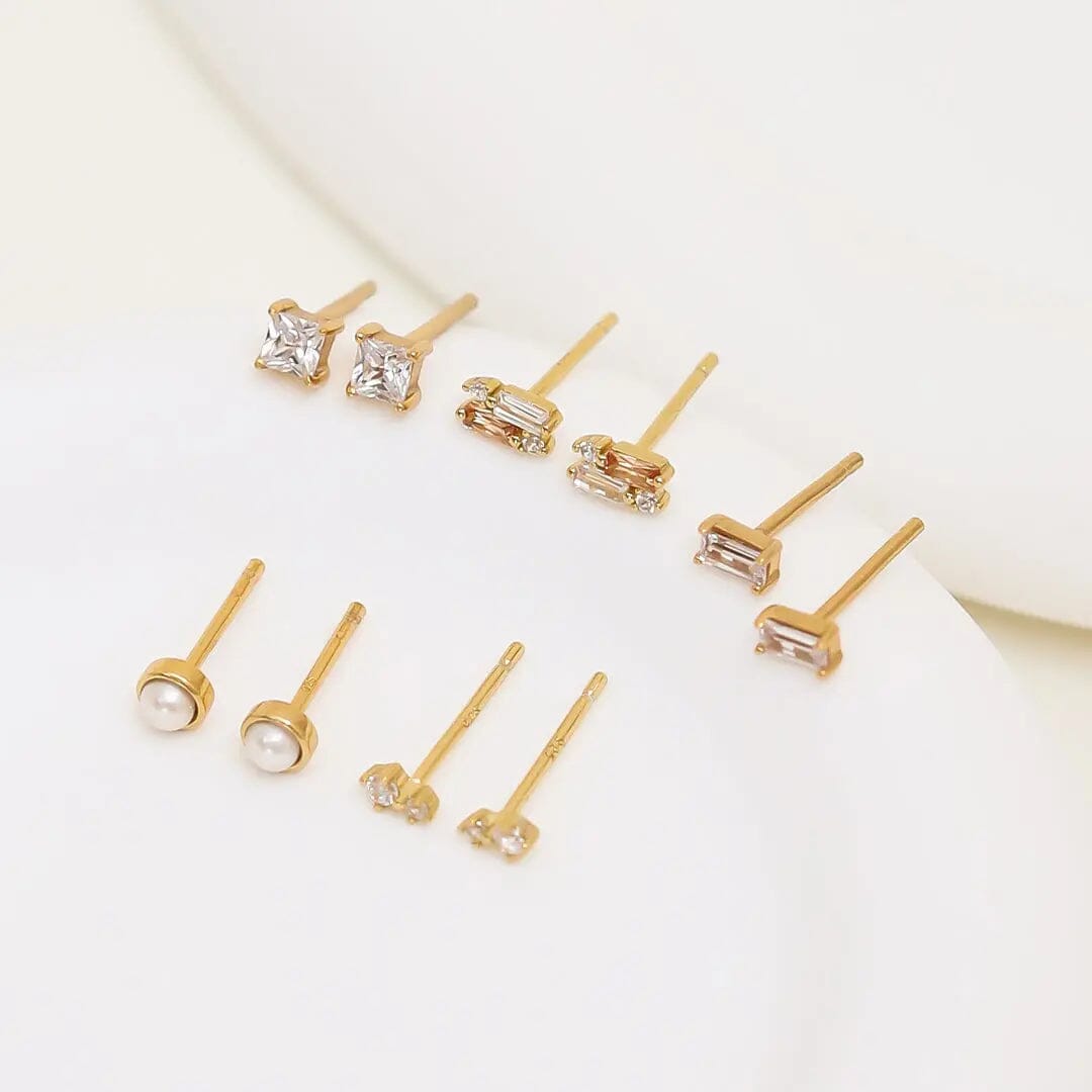 Pair of square cubic zirconia stud earrings on a white background
