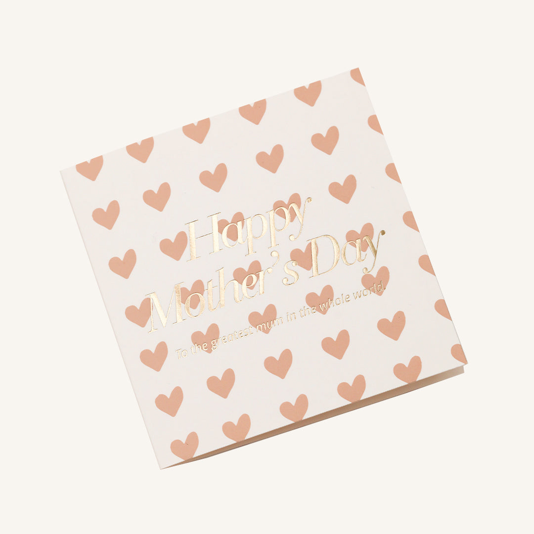 A selection of greeting cards displayed on a neutral background, featuring designs such as 'Happy Mother's Day', hearts, and the words 'mum' along with a general 'Love you mum' message.