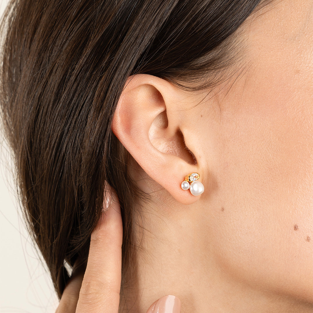 close up of studs in models ear