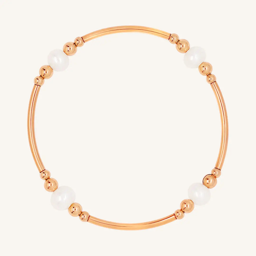 A rose bracelet with natural freshwater pearls, designed with a beaded pattern.