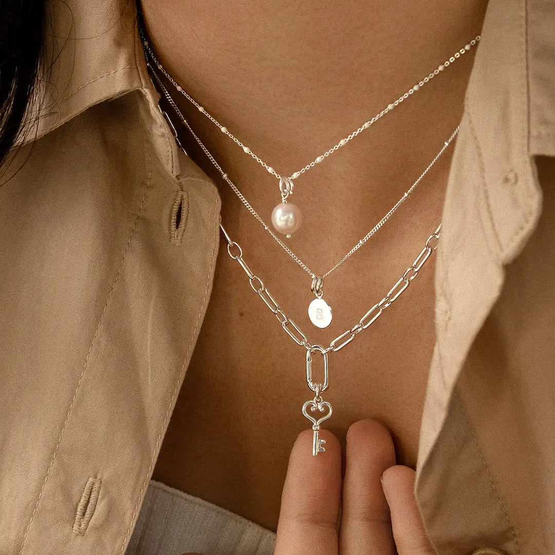 Pearl Charm - PEARL-CHARM-WORN.jpg