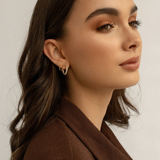 A Beginner Guide to Getting A Second Piercing And Styling It