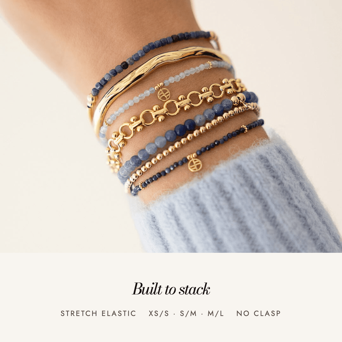 Sapphire Division Charm Bracelet: built to stack, stretch elastic, sizes XS/S to M/L