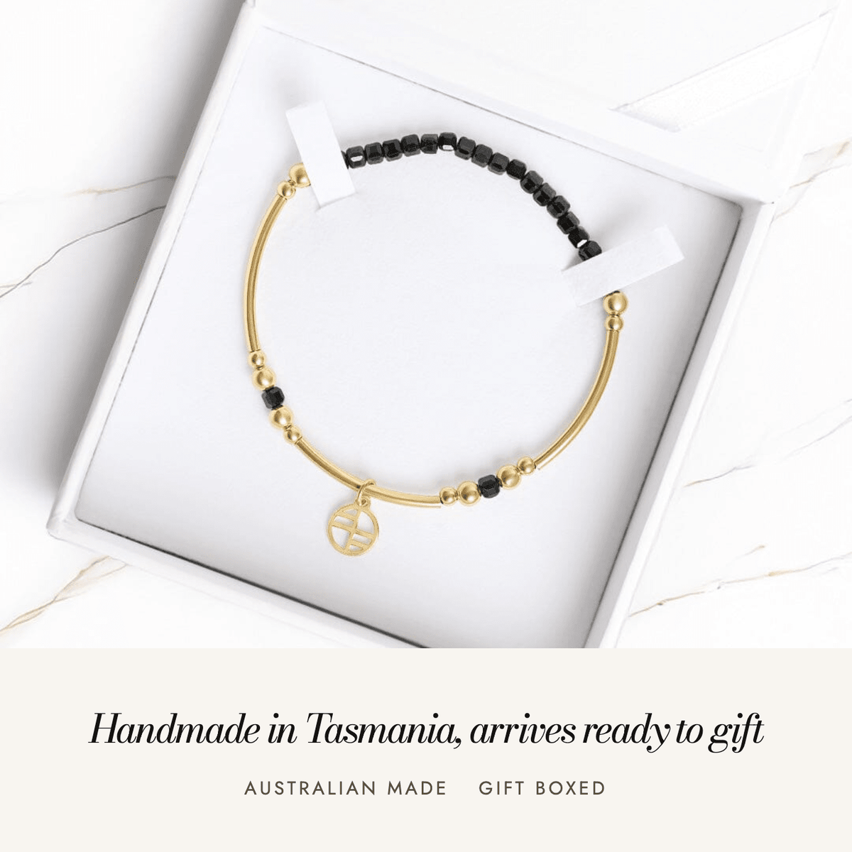 Black Spinel Division Charm Bracelet: handmade in Tasmania, arrives ready to gift