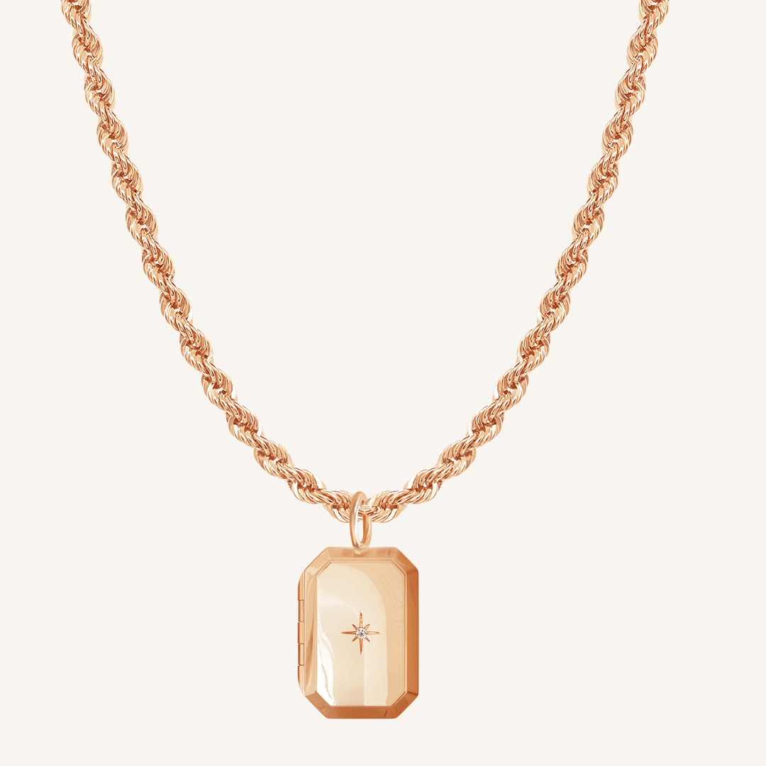 Rose Bevel Locket on rope chain on white background