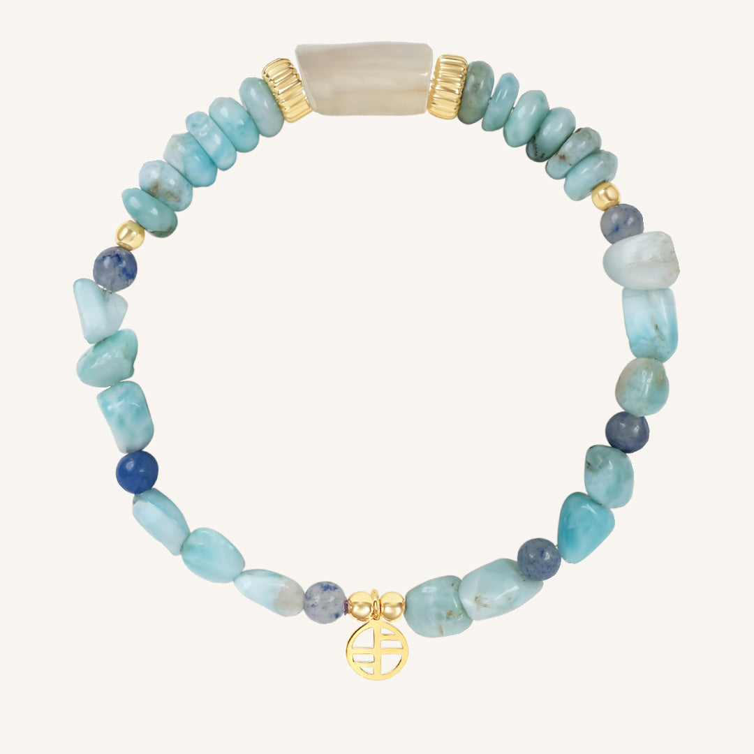 Beaded bracelet with blue and gold accents on a white background