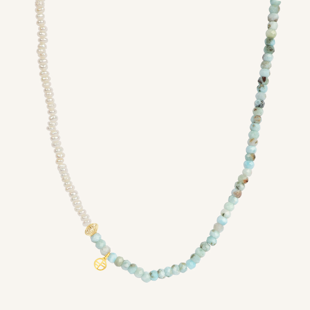 Necklace with small beads on a white background