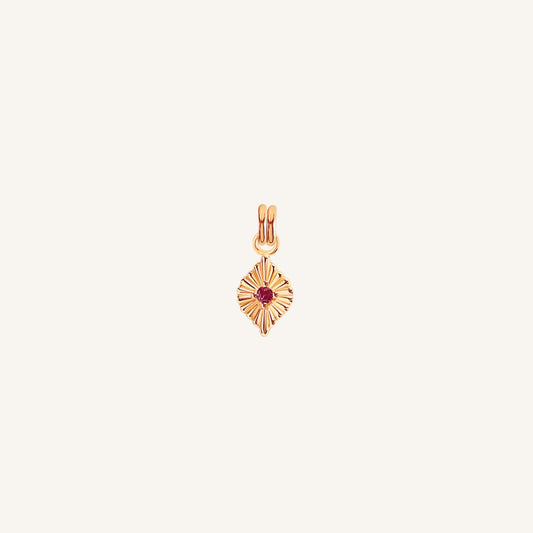 A rose birthstone charm with a ruby cubic zirconia representing the month of July.