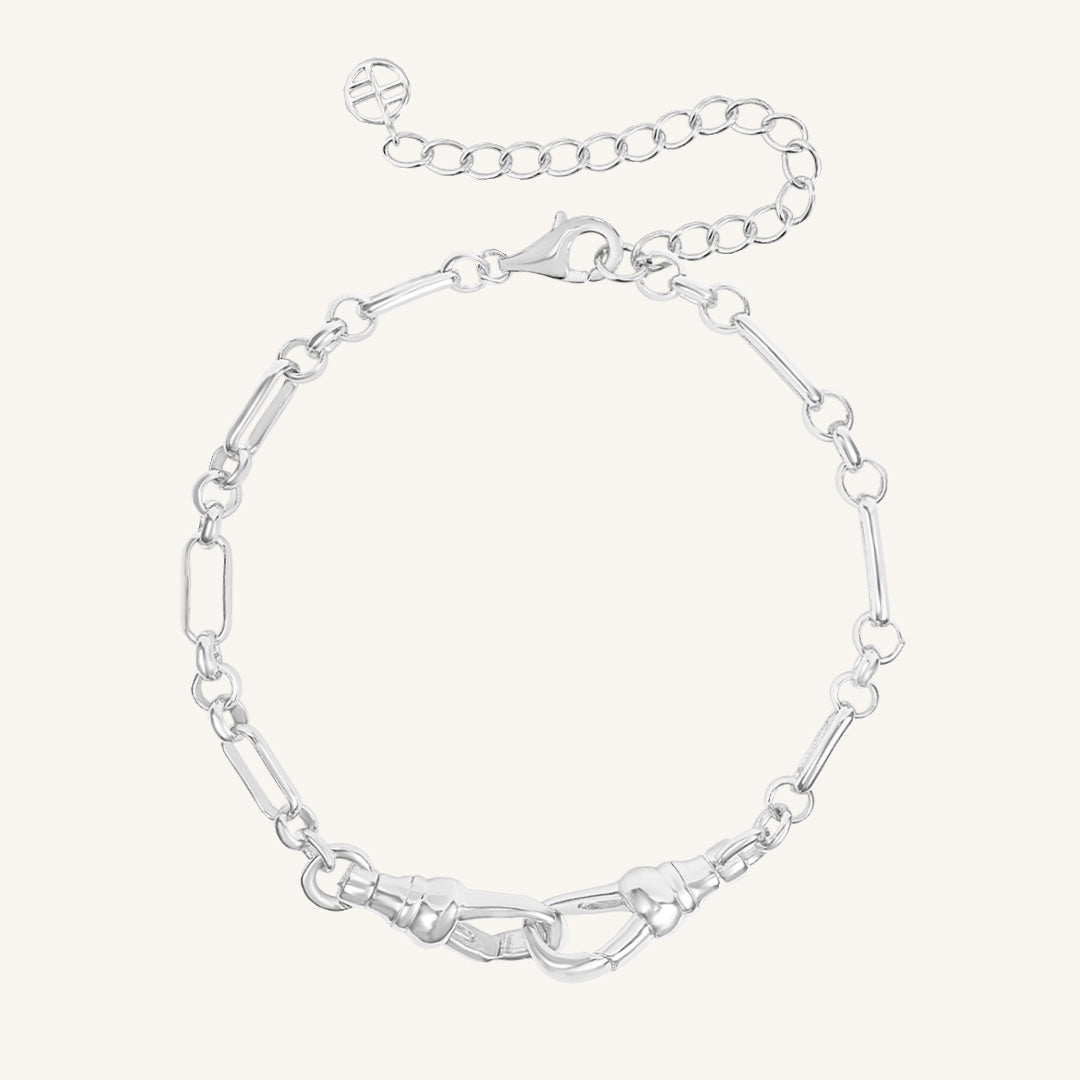 Silver chain bracelet on a white background