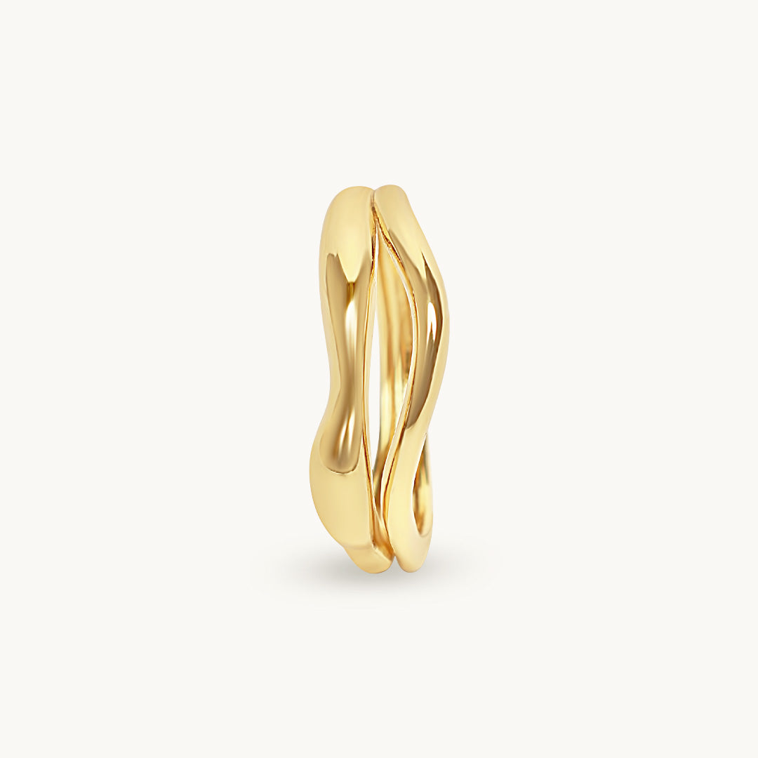 Gold ring on a white background