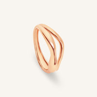Rose gold ring on a light gray background