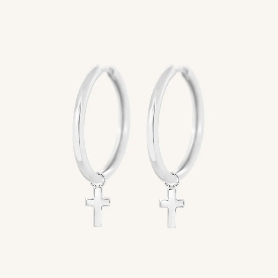 The  SILVER-Riley  Cross Plain Hoops by  Francesca Jewellery from the Earrings Collection.