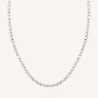 A tennis chain necklace with silver metal tone.