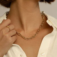 A chunky link chain necklace in silver tone.