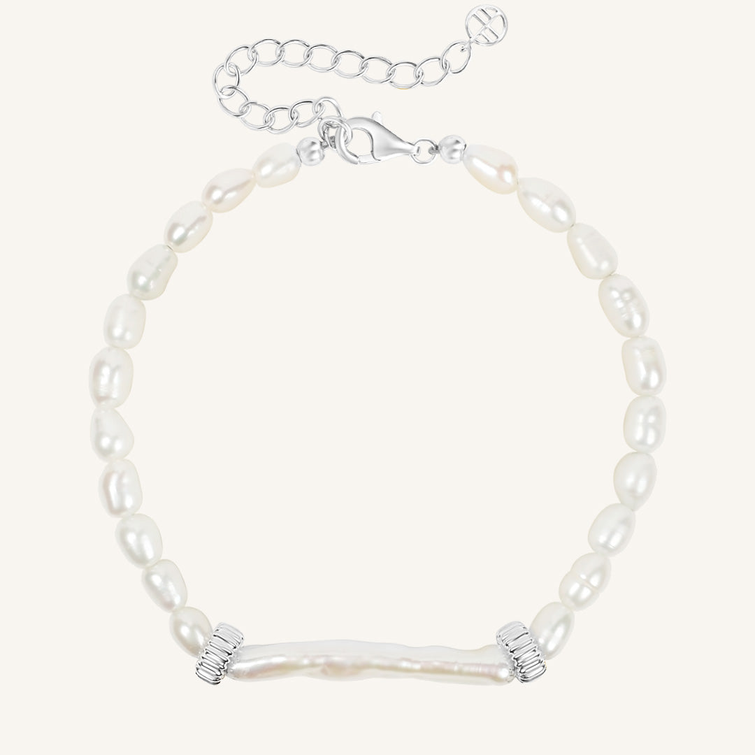 Pearl bracelet with a silver clasp on a white background