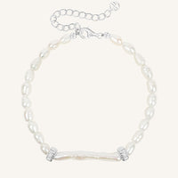 Pearl bracelet with a silver clasp on a white background