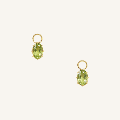 A set of two gold hoop charms with olive green stones, isolated on a white background.