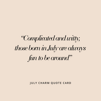 A gold birthstone charm with a ruby cubic zirconia representing the month of July.