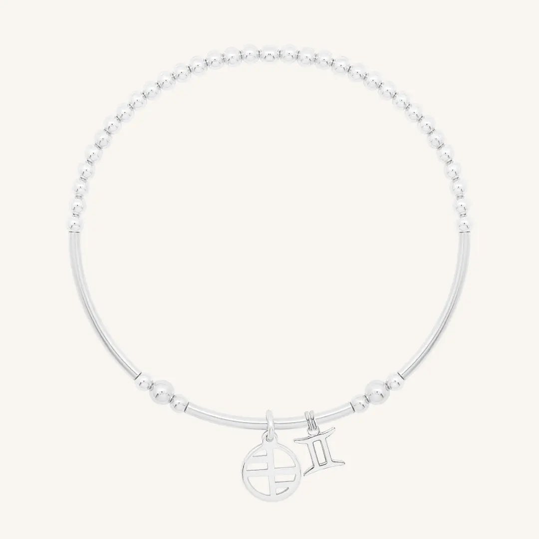 The    Petite Zodiac Charm Gemini by  Francesca Jewellery from the Charms Collection.