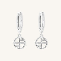 A pair of silver-tone drop earrings with the francesca logo