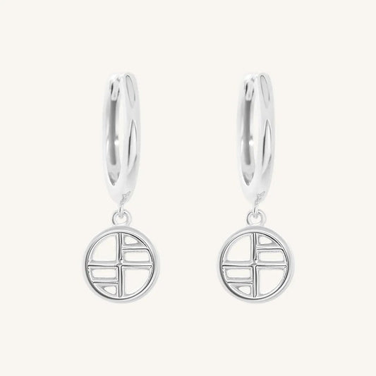 A pair of silver-tone drop earrings with the francesca logo
